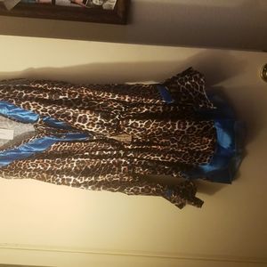 Leopard Mini dress New with cold shoulder sleeves. So cute New with tags